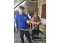 Damkar  Evakuasi Ular Coros Sepanjang 1,5 Meter di Pemukiman